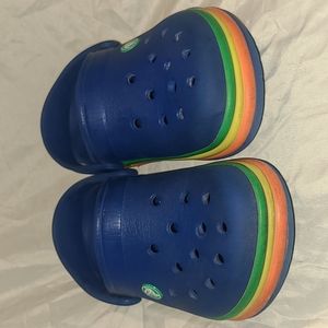 Crocs blue with green yellow and orange bands 1J